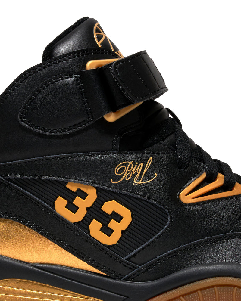 Ewing Athletics KROSS X "BIG L" sneakers, black leather upper with gold accents, signature "Big L" and "33" detailing, side view.