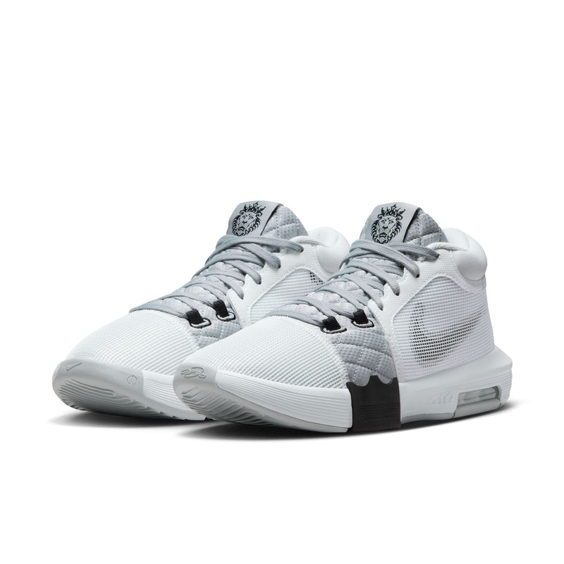 Nike LeBron Witness 8 basketball shoes in white and gray with mesh upper, Air cushioning, and lion logo on tongue, front angle view.