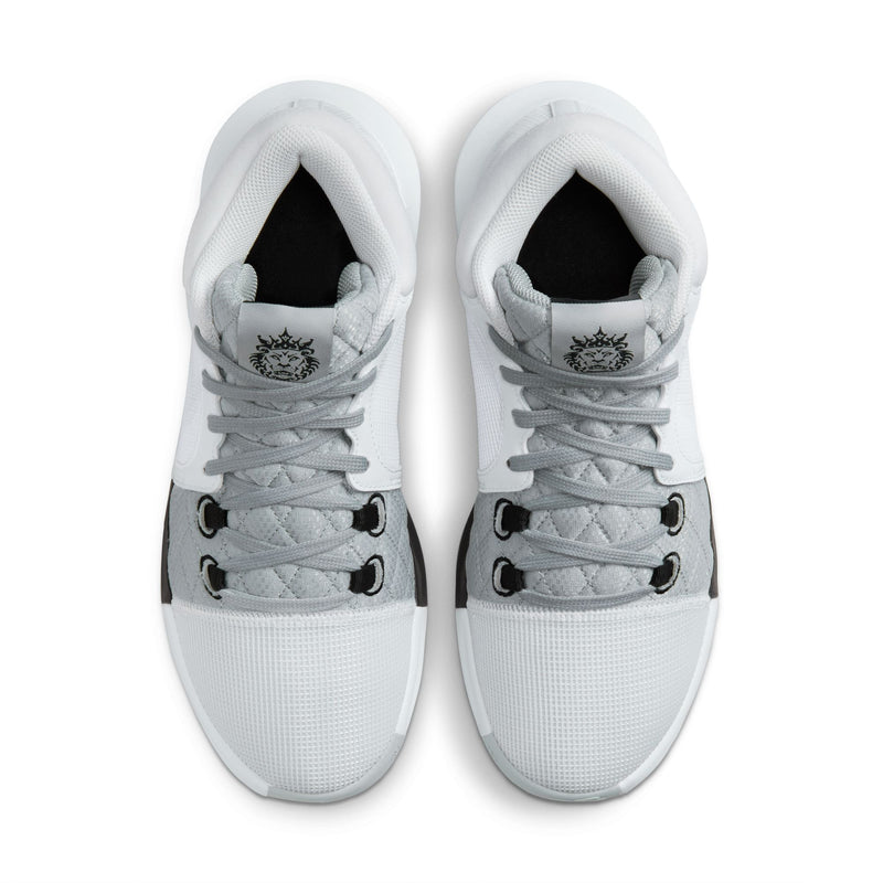 Nike LeBron Witness 8 basketball shoes in white and gray with quilted upper and branding on tongue, top view.