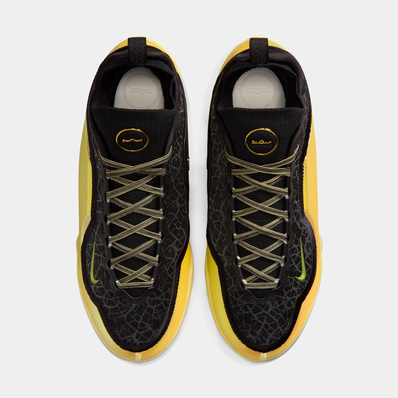 Nike LeBron XXIII Elite "Hurt Feelings" basketball shoes, black and yellow with textured upper, gold accents, and lace system, top view