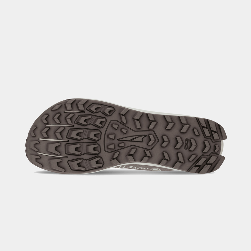 Altra Lone Peak 9 GTX trail running shoes outsole with rugged brown rubber tread for superior traction and durability.