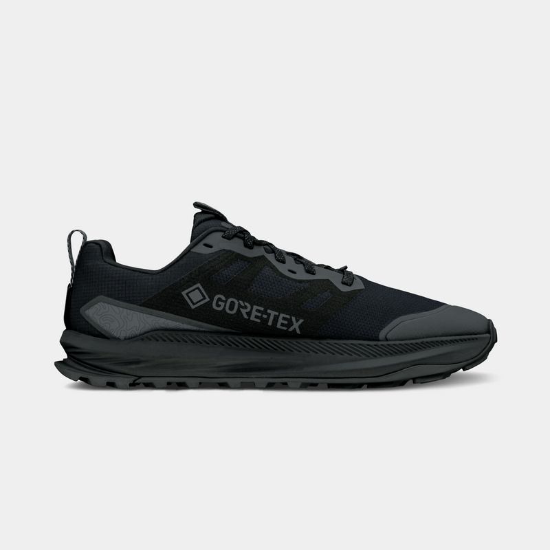 Altra Lone Peak 9 GTX trail running shoe in black with Gore-Tex waterproof upper and rugged outsole, side view.