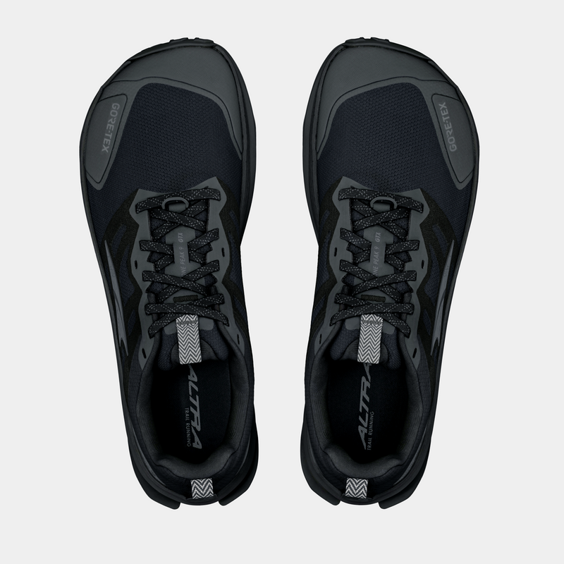 Altra Lone Peak 9 GTX trail running shoes in black with Gore-Tex upper and durable laces, top view.