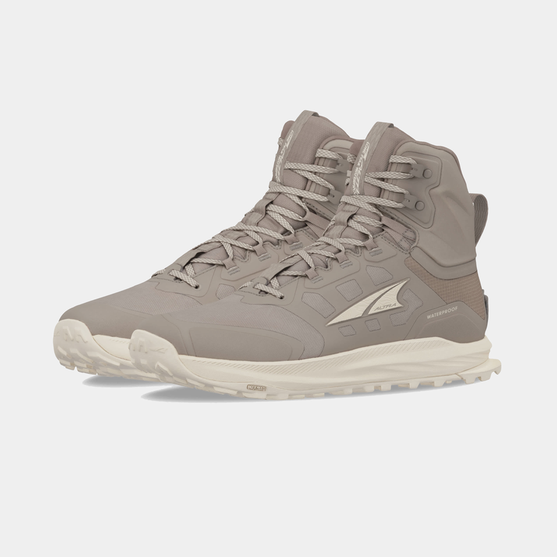 Altra Lone Peak 9 Waterproof Mid hiking boots in taupe with a mid-cut design, waterproof material, and textured outsole, side view.