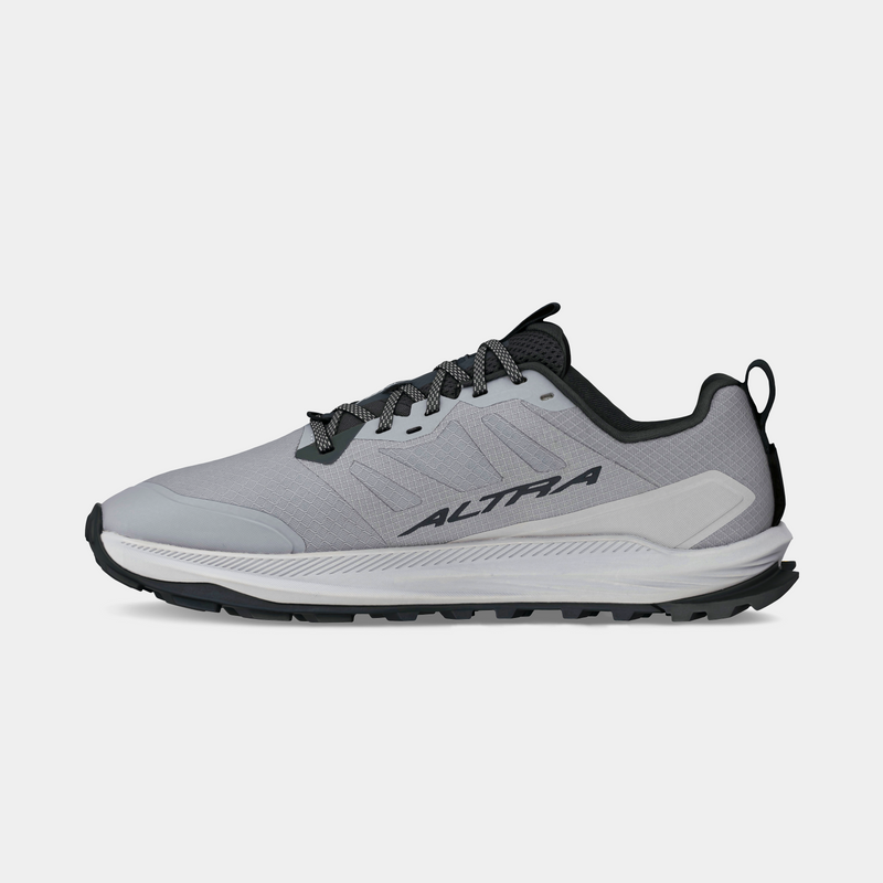 Altra Lone Peak 9+ trail running shoes in light gray with black accents, durable mesh upper, and cushioned sole, side view.