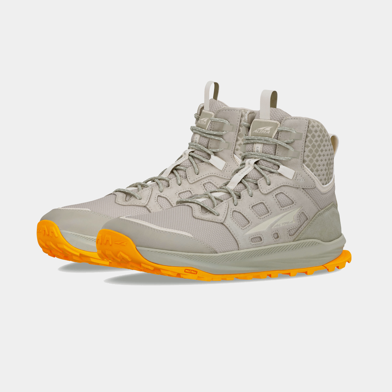 Altra Lone Peak Hiker 3 hiking boots in gray mesh upper with honeycomb details and orange rugged outsole, angled side view.