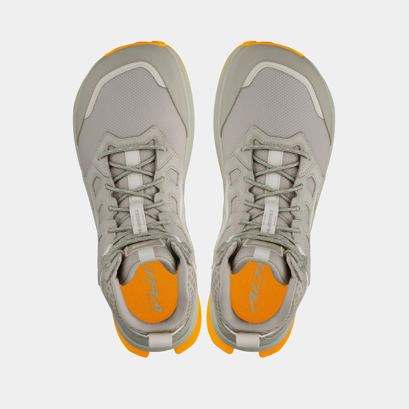 Altra Lone Peak Hiker 3 hiking shoes top view featuring a gray mesh upper, reinforced toe caps, orange heel accents, and cushioned collars.