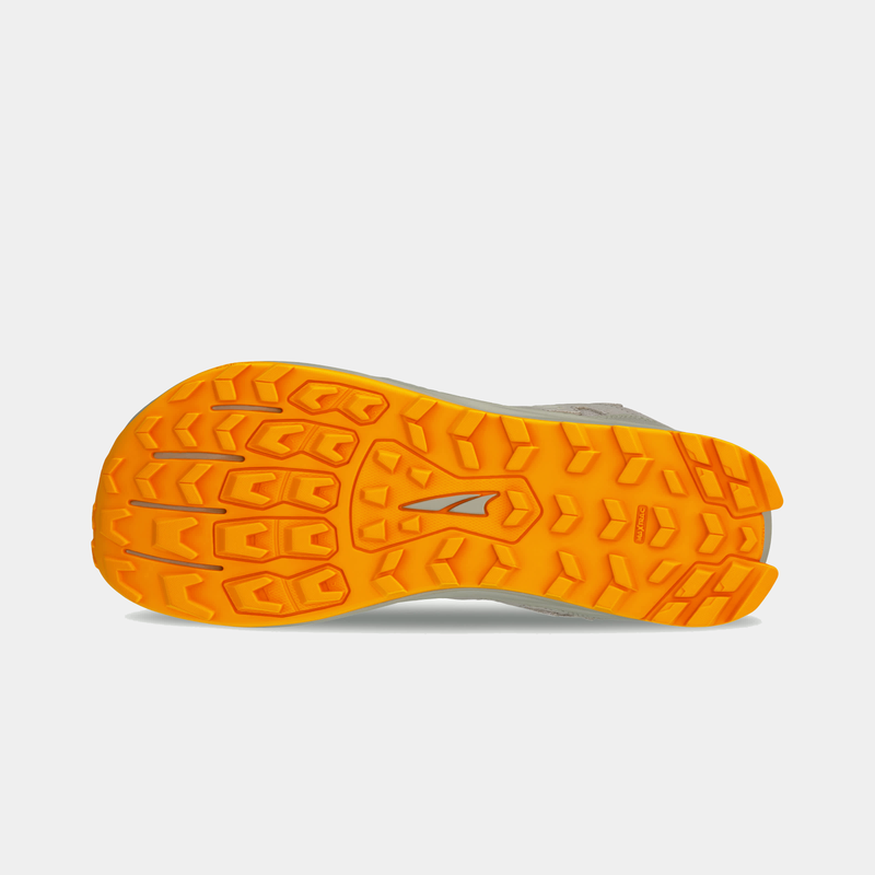 Altra Lone Peak Hiker 3 hiking shoes outsole in bright orange with multi-directional traction lugs and durable rubber material.