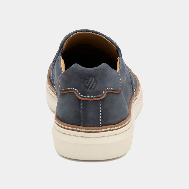 Johnston & Murphy McGuffey 2 Perfed Slip-On shoes in blue with tan trim, back view showing heel details.