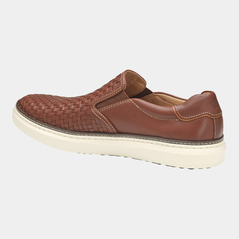 Johnston & Murphy McGuffey 2 Woven Slip-on shoes in brown leather with woven design, side view showing white sole.