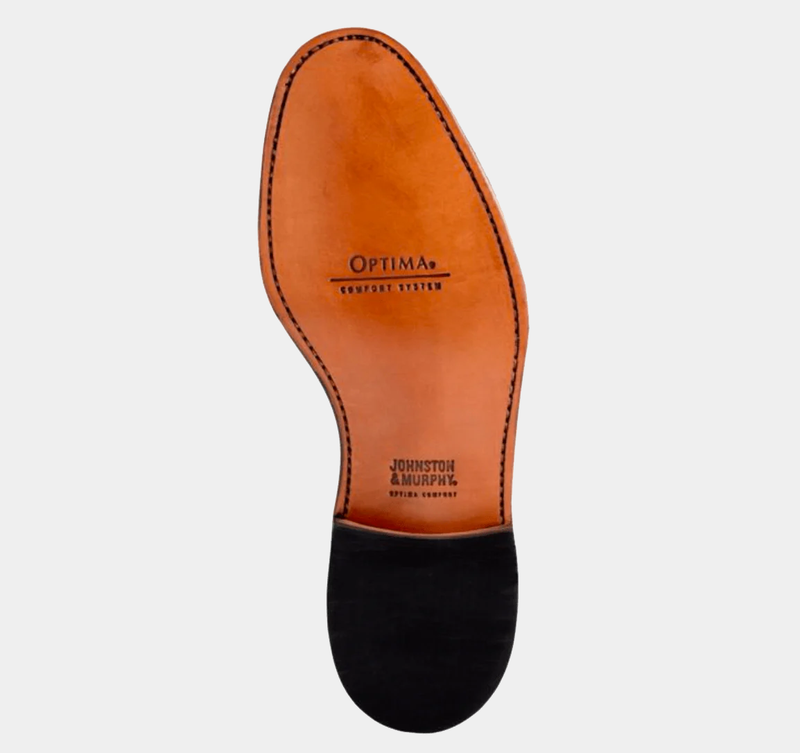 Johnston & Murphy Melton Cap Toe shoe sole in tan leather with Optima Comfort System branding and black heel, bottom view.