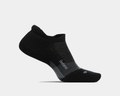 Feetures Merino 10 Ultra Light Cushion No Show Tab socks in black, featuring a low-cut design and targeted compression, side view.