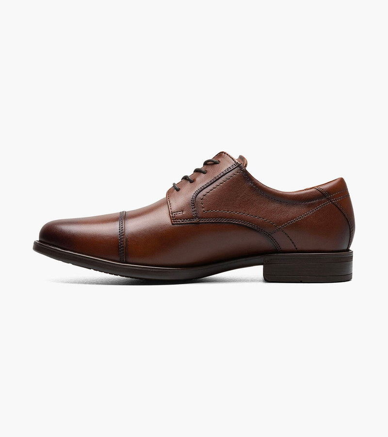 Florsheim Midtown Cap Oxford dress shoes in rich brown leather with cap toe design and stitched details, side view.
