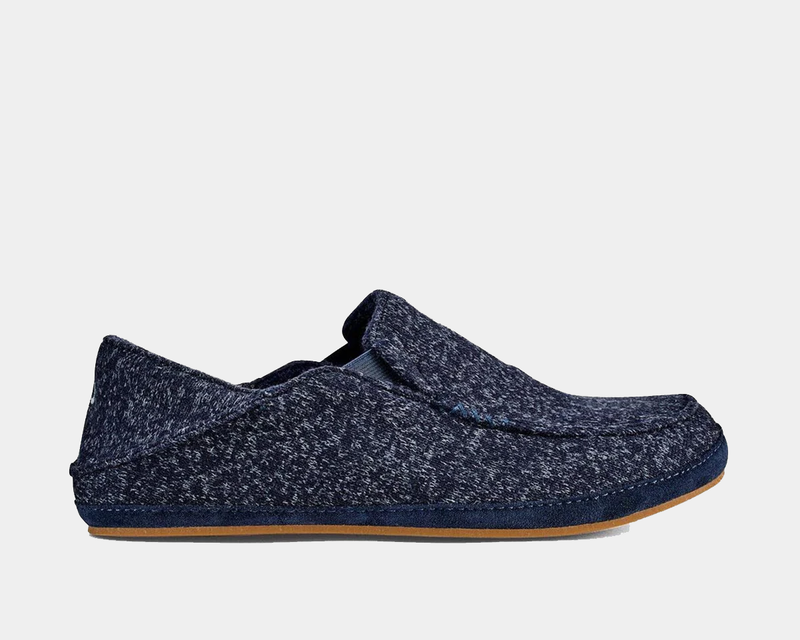 OluKai Moloa Hulu slippers in dark navy textured fabric with wool upper and soft fleece lining, side view.