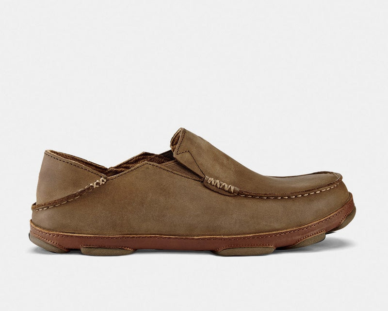 OluKai Moloa slip-on shoes in brown leather with moccasin-style stitching and foldable heel, side view.