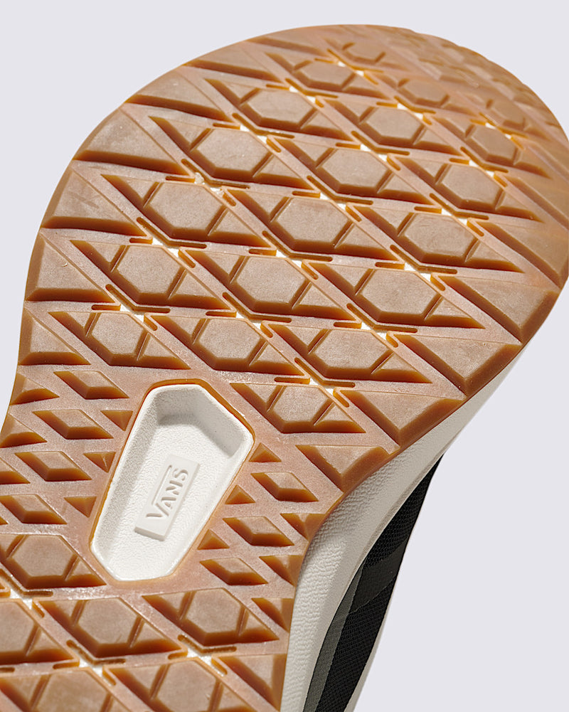 Vans MTE Ultrarange 2.0 shoe outsole with hexagonal pattern, gum rubber material, and embossed logo, sole/bottom view.