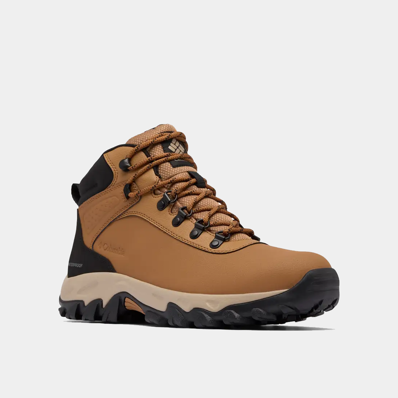 Columbia Newton Explorer hiking boots, tan with black accents, waterproof leather upper and rugged outsole, side view.