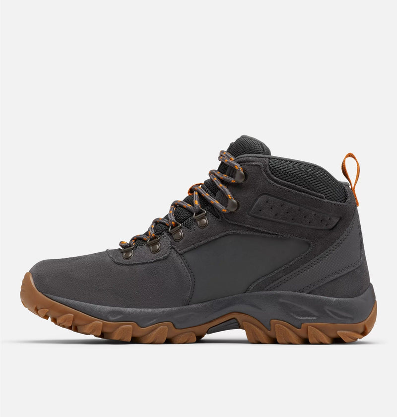 Columbia Newton Ridge™ Plus II Suede WP hiking boots in dark gray suede with orange accents and rugged brown outsole, side view.