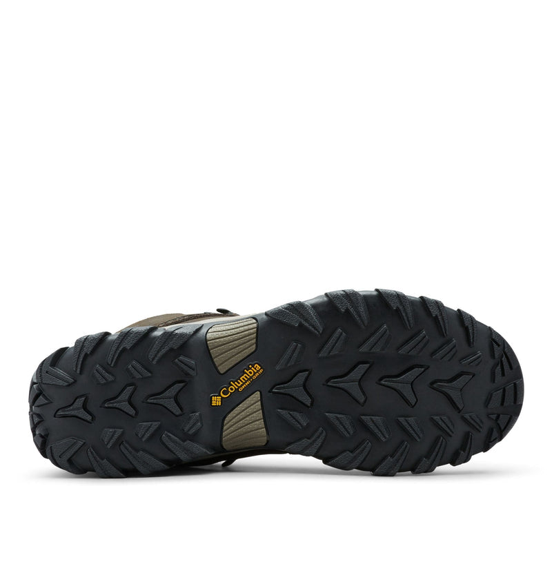 Columbia Newton Ridge Plus II Waterproof hiking boots outsole with rugged tread design and branding in black rubber, sole view.