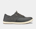 OluKai Nohea Moku casual shoes in dark gray with breathable mesh upper, lightweight construction, and cream sole, side view.