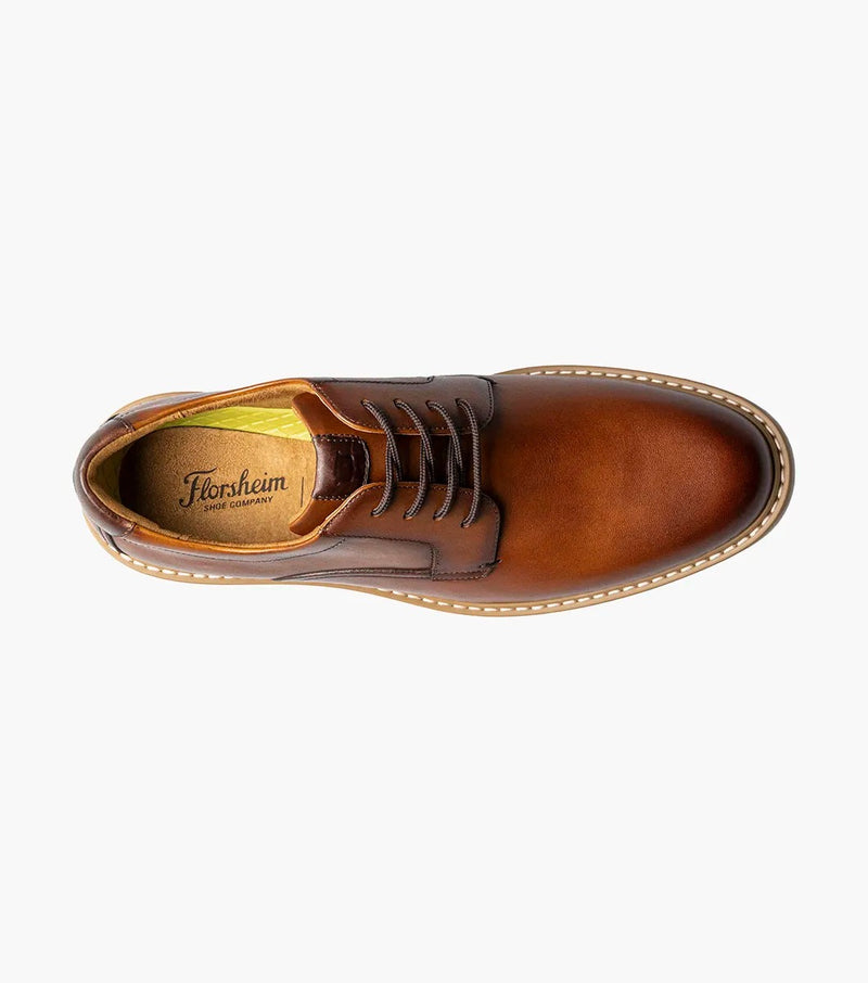 Florsheim Norwalk Plain Toe Oxford shoes in rich brown leather with stitched detailing and lace-up closure, top view.
