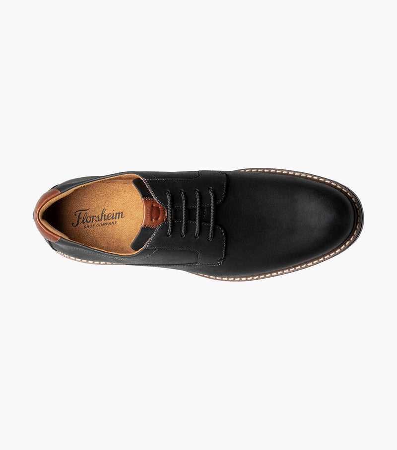 Florsheim Norwalk Plain Toe Oxford shoes top view in black leather with brown lining and stitched detailing.