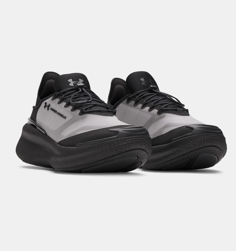 Under Armour Nova SlipSpeed™ shoes in black and gray with a slip-on design and cushioned sole, front angled view.