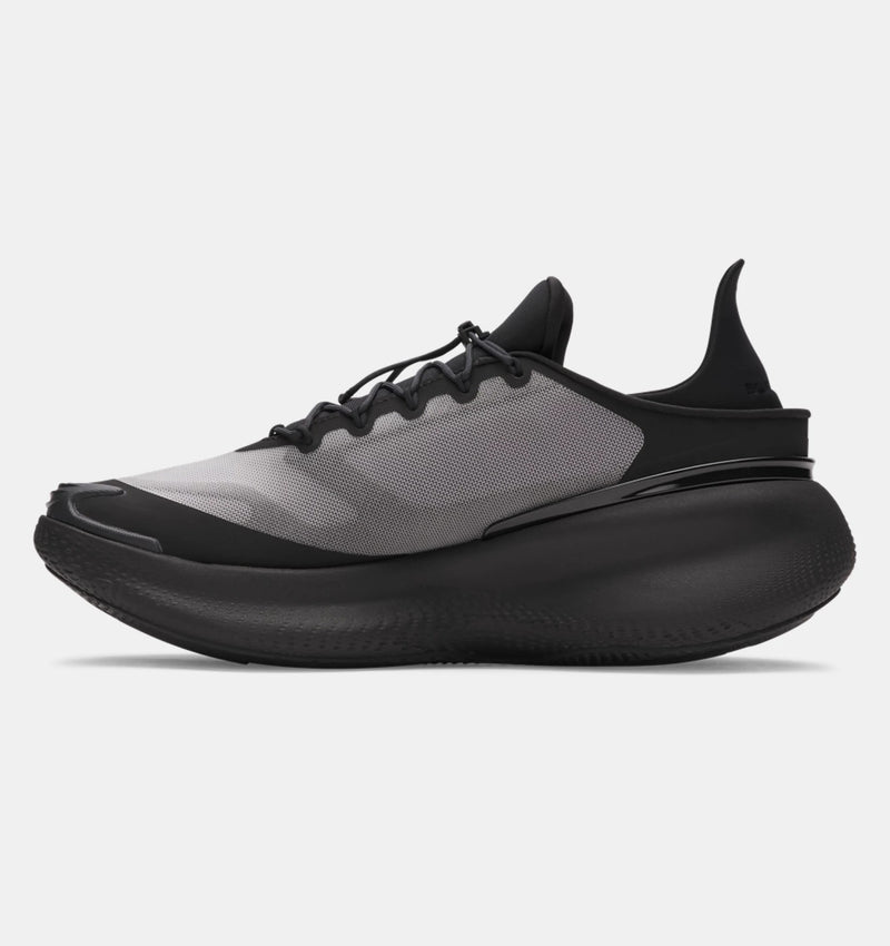 Under Armour Nova SlipSpeed™ running shoes in black and gray with mesh upper and slip-on design, side view.