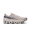 Beige running shoe with unique sole design on a white background