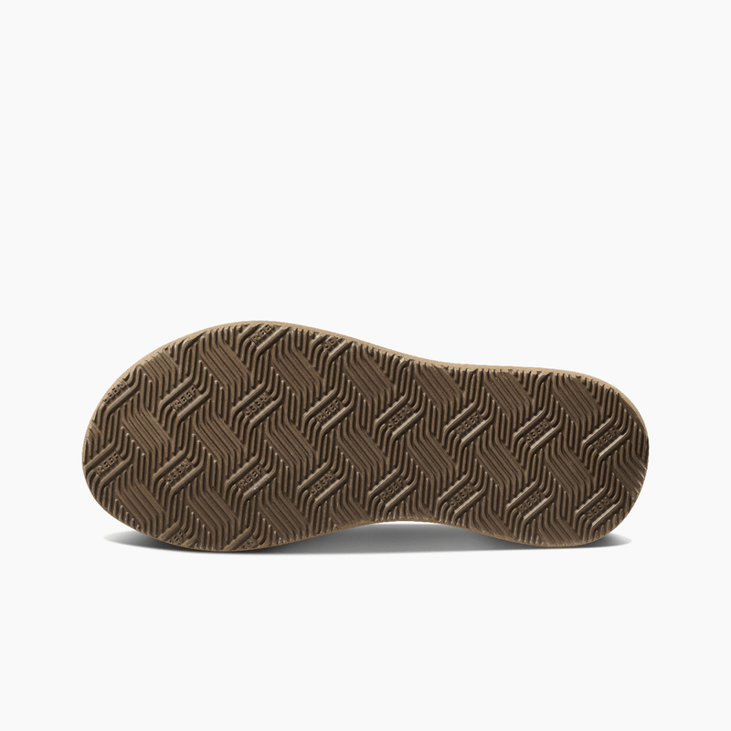 Reef Phantom II sandal outsole in brown rubber featuring herringbone tread pattern, bottom view.