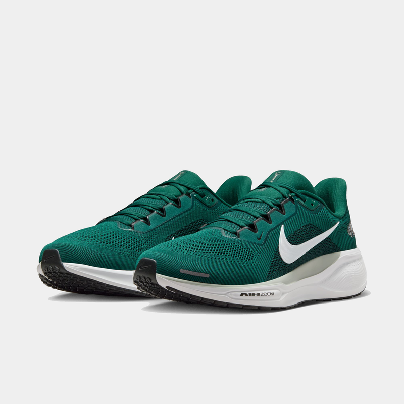 Nike Philadelphia Eagles Pegasus 41 running shoes in green with mesh upper, white Nike Swoosh, and Air Zoom cushioning, front angle view.