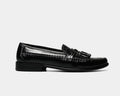 Florsheim Pisa dress loafers in black leather with tassel detailing and stitched accents, side view.