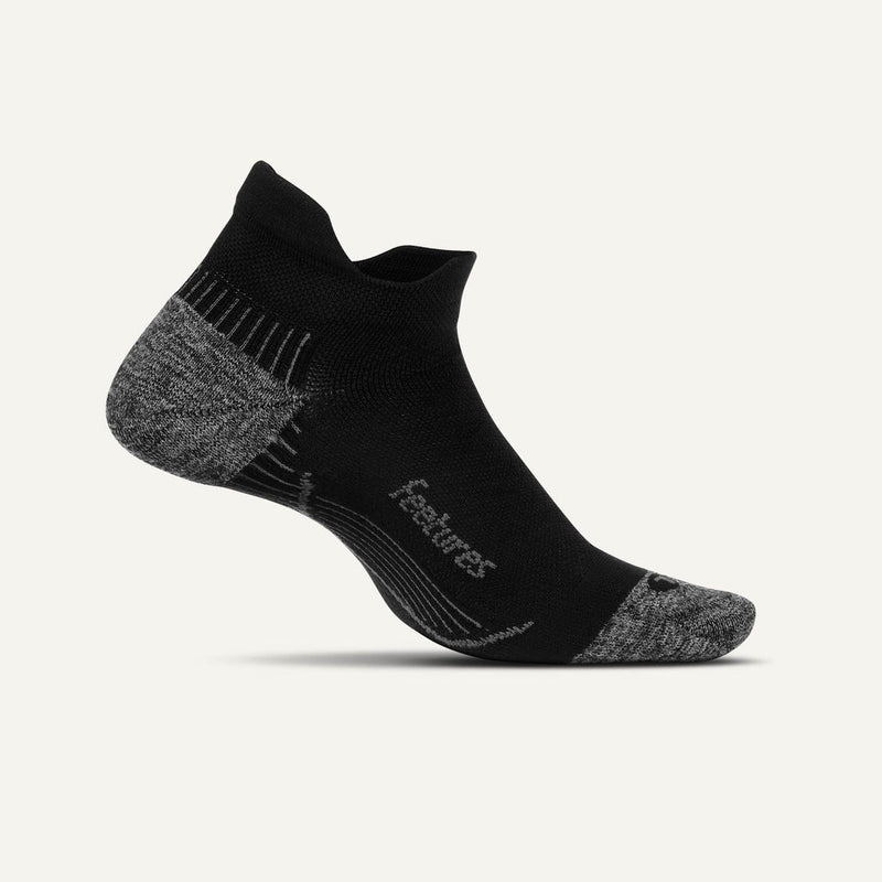 Feetures Plantar Fasciitis Relief Sock Light Cushion No Show Tab in black and gray, side view showing arch support and seamless design.