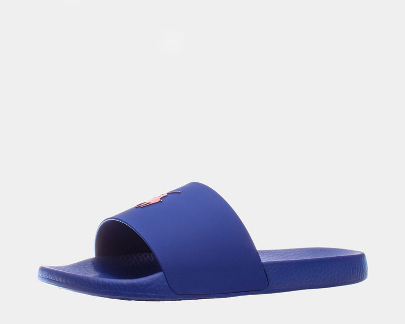 Polo Ralph Lauren Polo Signature Slide sandals in royal blue with textured footbed and red logo detail on the strap, side angle.