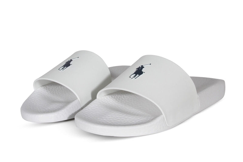 Polo Ralph Lauren Polo Signature Slide sandals in white with textured footbed and black logo on the strap, angled front view.