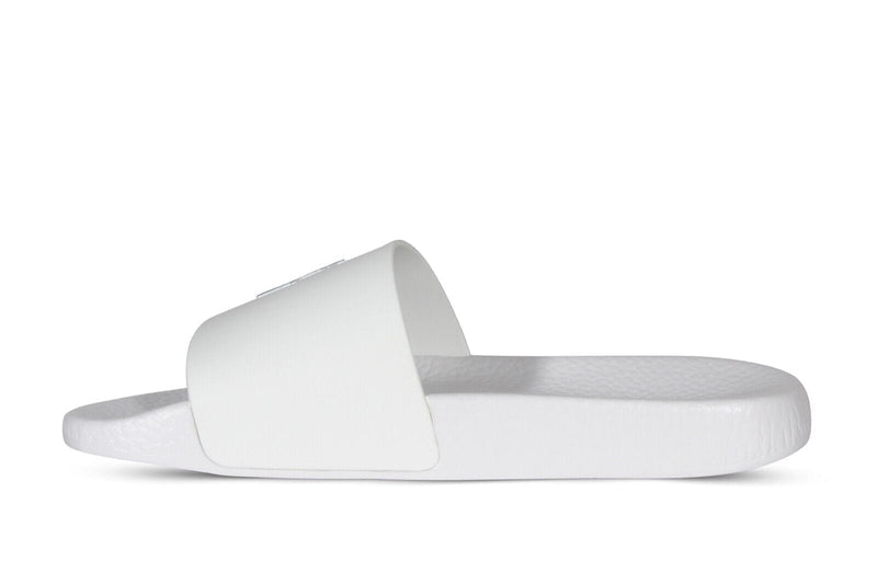 Polo Ralph Lauren Polo Signature Slide sandals in solid white with embossed logo detail and textured footbed, side view.