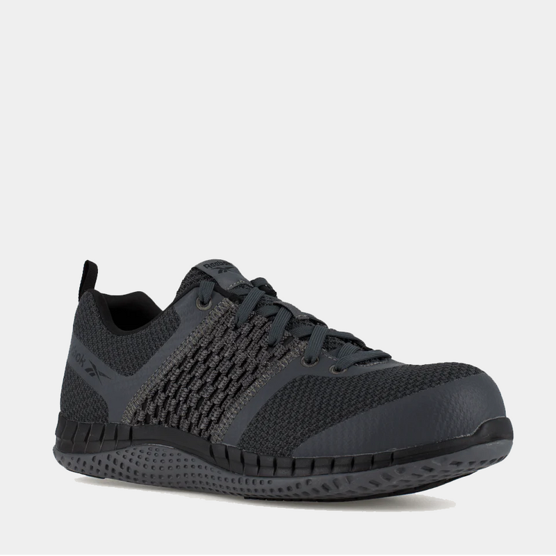 Reebok Work Print Work ULTK work shoes in dark gray with woven mesh upper and reinforced toe cap, front angled view.