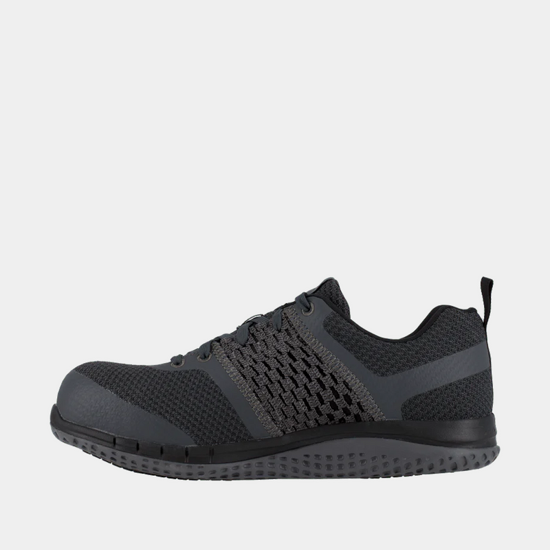Reebok Work Print Work ULTK work shoes in charcoal gray with knit mesh upper and slip-resistant sole, side view.