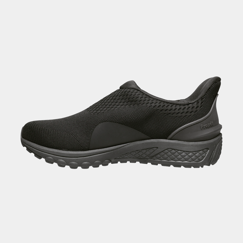 Propét One Velocity Slip-On shoes in black with a knitted mesh upper, cushioned midsole, and slip-on design, side view.