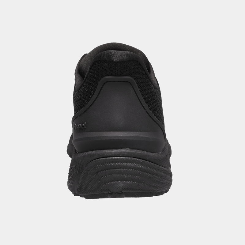 Propét One Velocity Step-In Sneaker in black mesh and synthetic materials with cushioned heel, back view showing textured sole.