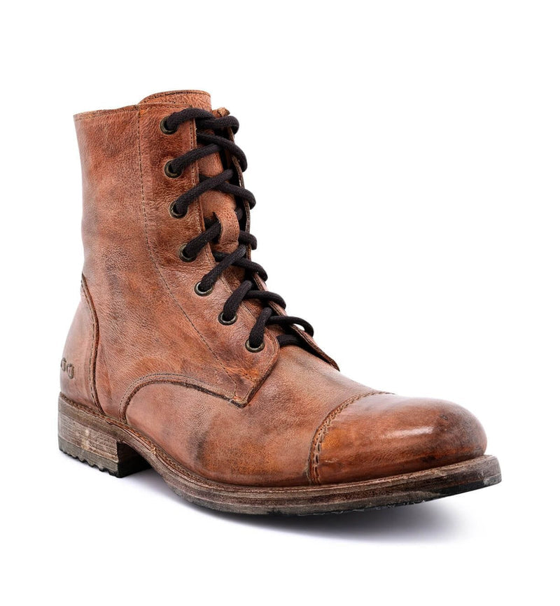 Bed Stu Protege Vintage Finish boots in distressed brown leather with cap toe, lace-up closure, and sturdy stacked heel, front angle view.
