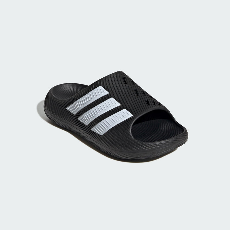 Adidas PURECHILL Slides, black with three white stripes, textured footbed, side view.