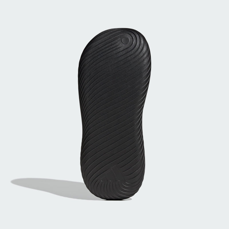Adidas PURECHILL Slides outsole in black with textured design and Adidas logo.