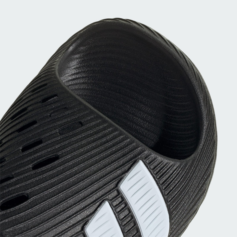 Adidas PURECHILL Slides black with white stripes, top view showing textured strap and footbed design.