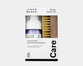 Jason Markk Quick Clean Kit featuring foaming cleaner and soft bristle brush for delicate materials, front view in retail packaging.