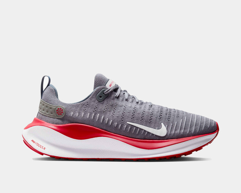 Nike React Infinity Run 4 running shoes in gray with red accents, breathable mesh upper, and React foam midsole, side view.