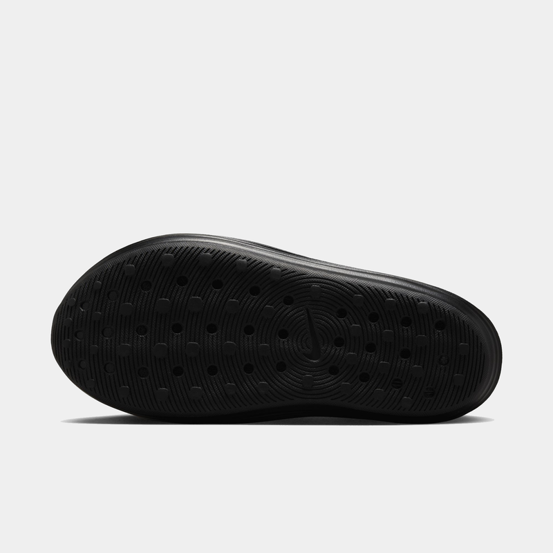 Nike ReactX Rejuven8 outsole in black with textured grip pattern and perforated ventilation, bottom view.