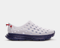 Kane Revive recovery shoes in white with perforated upper and navy blue sole featuring red speckle design, side view.
