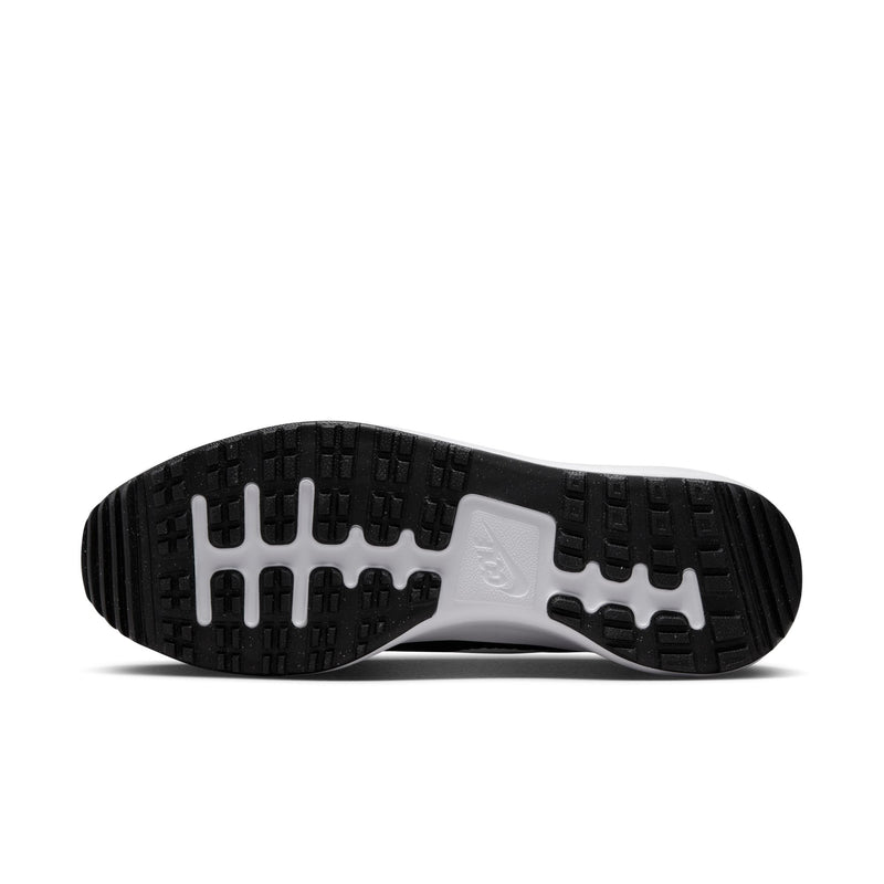 Nike Roshe Golf Next Nature golf shoe outsole in black and white showing durable traction pattern and Nike logo.