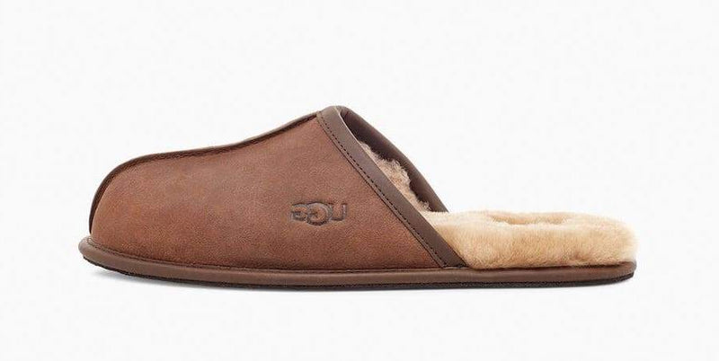 UGG Scuff Leather Slipper in chestnut brown with plush shearling lining and embossed logo, side view.